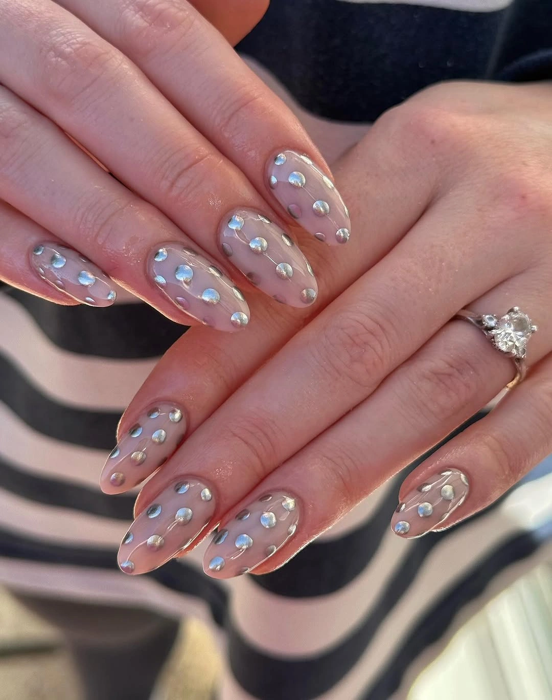 playful polka dot fall nails 2026 Sheer Pink Nails With Silver and Mauve Dot Accents