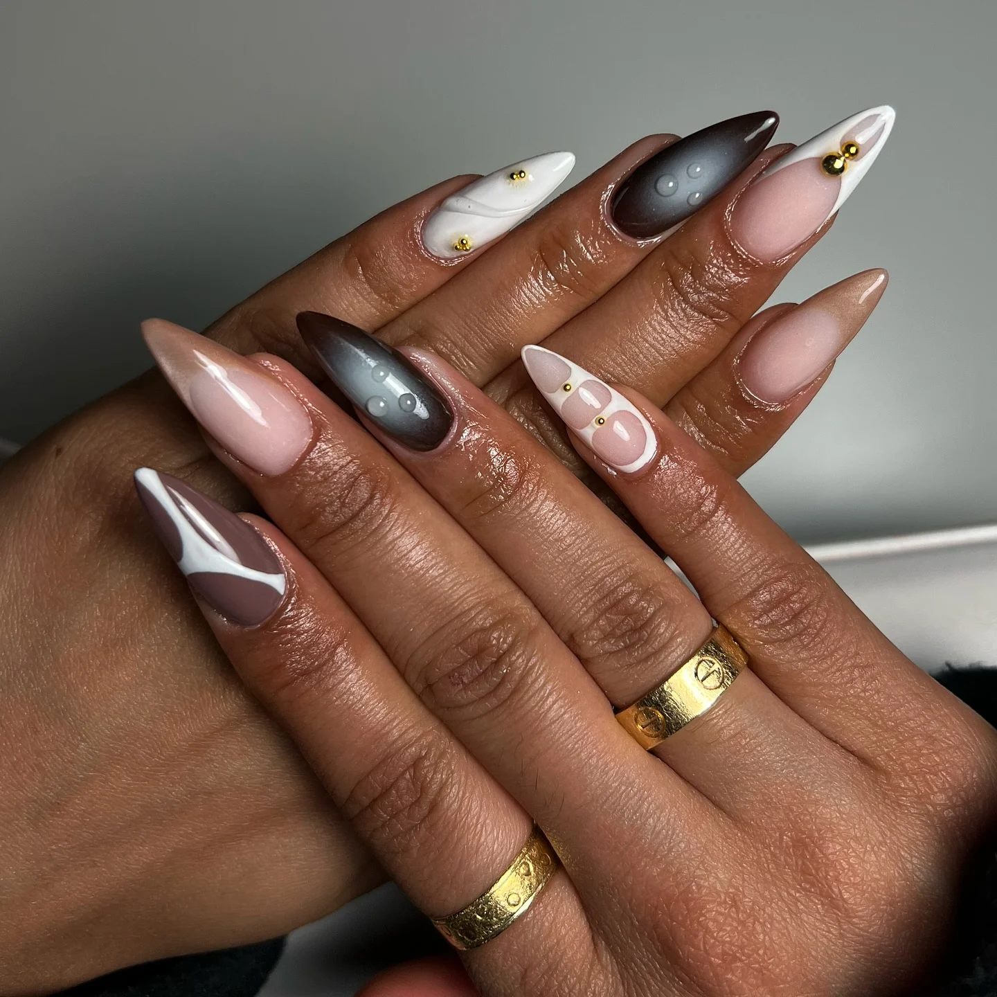 rich brown fall nails 2026 Soft Cocoa Swirls With Modern French Details