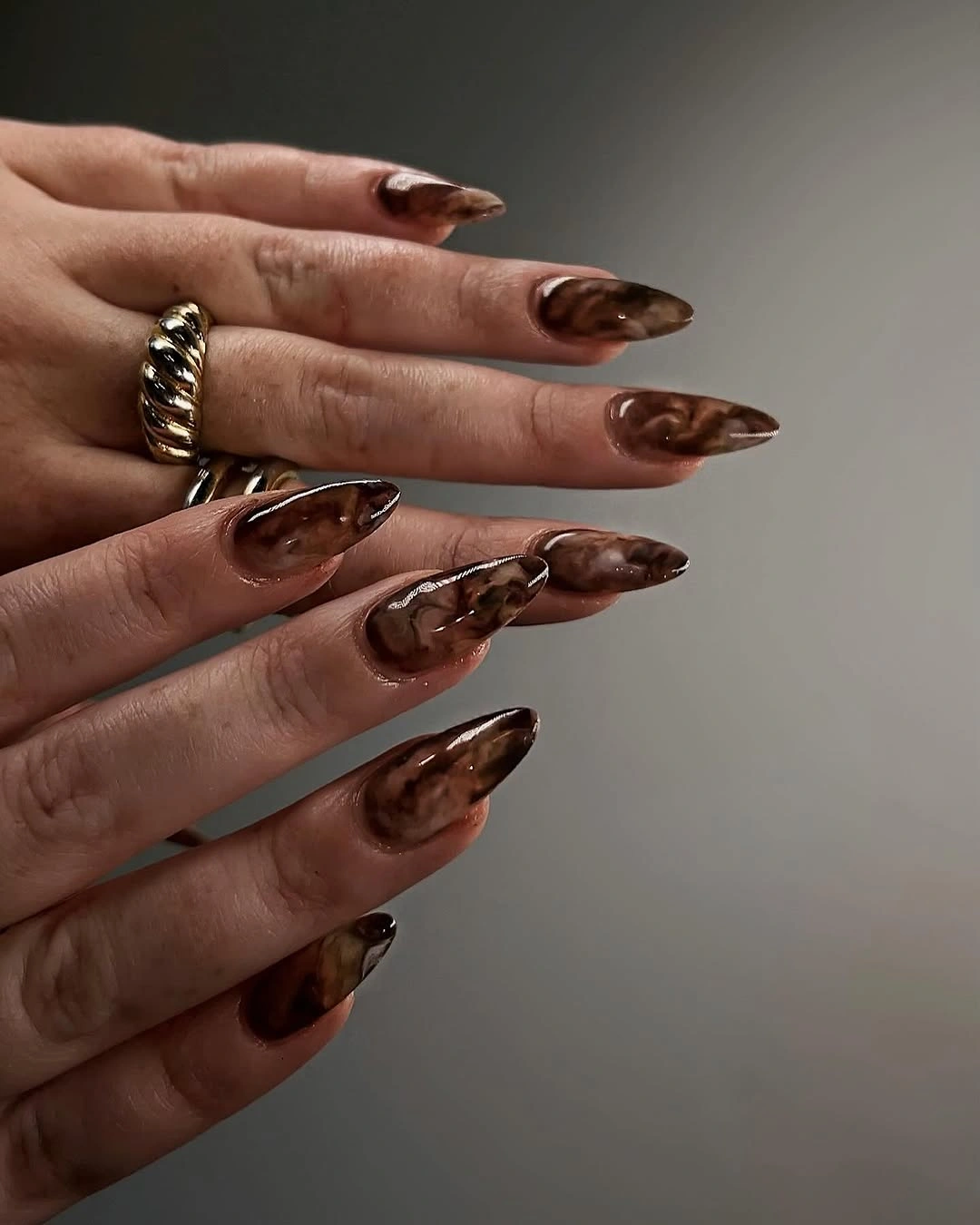 rich brown fall nails 2026 Glossy Chocolate Marble Elegance