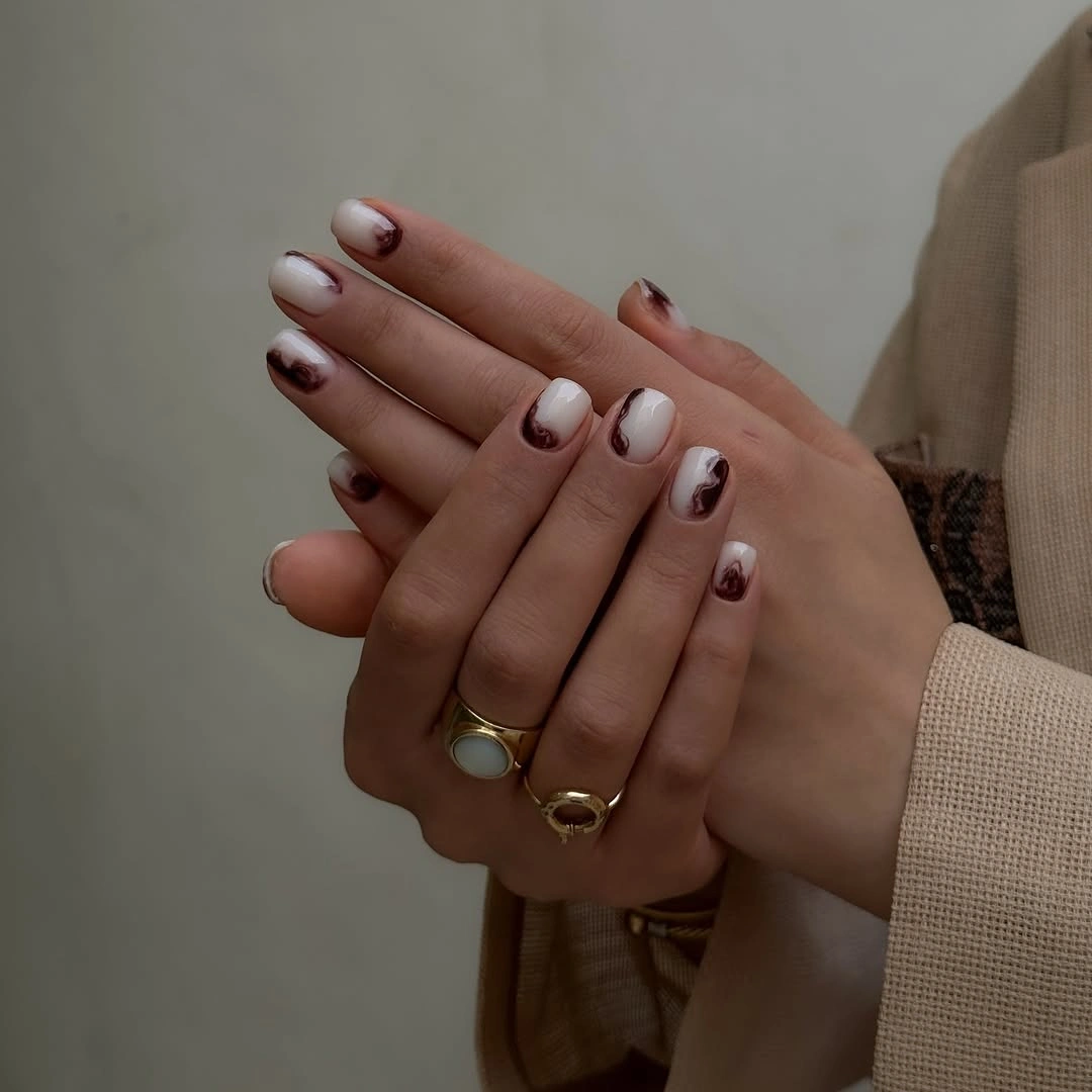 rich brown fall nails 2026 Minimal White And Brown Abstract Nails