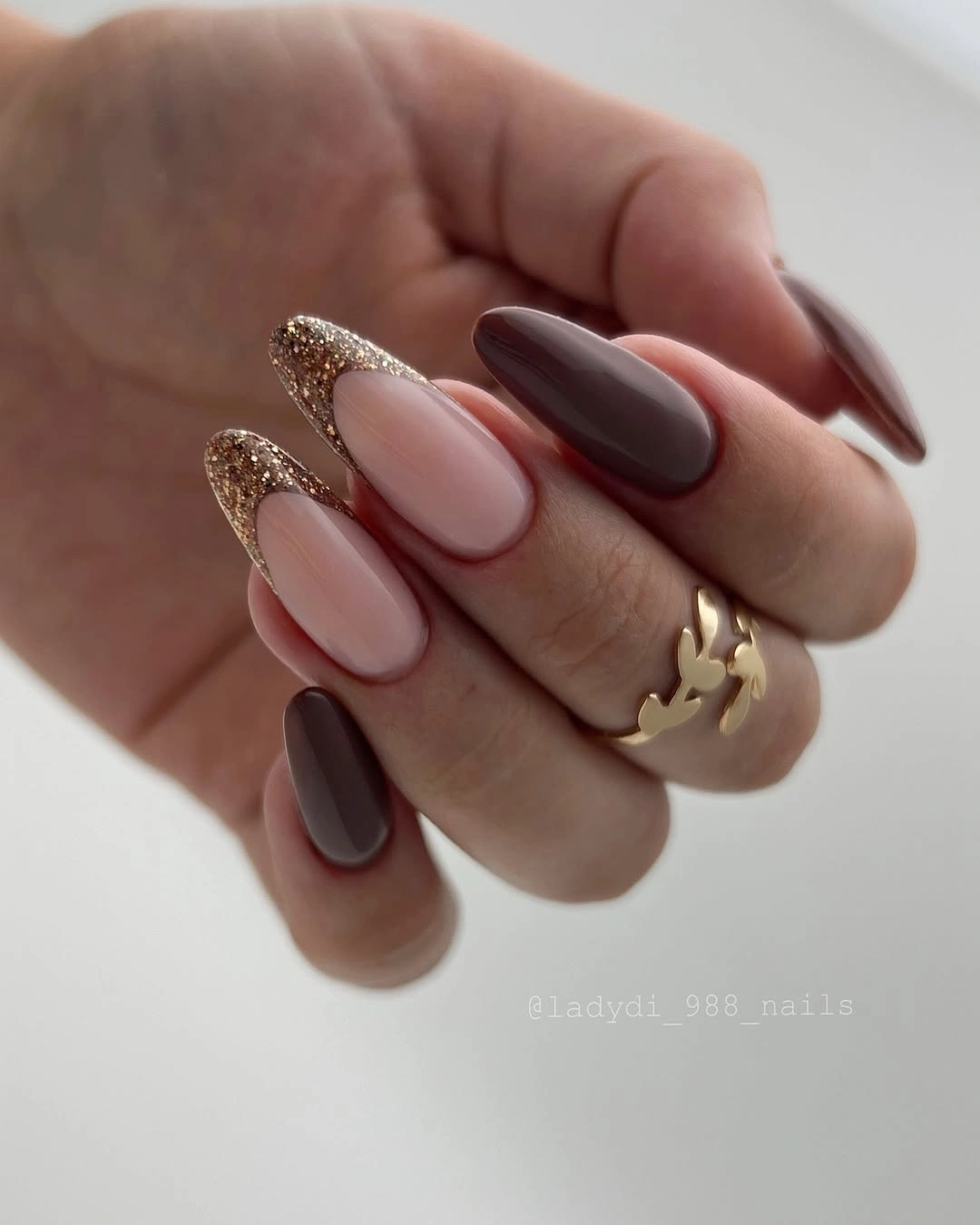 rich brown fall nails 2026 Chocolate Almond Nails With Champagne Glitter Tips