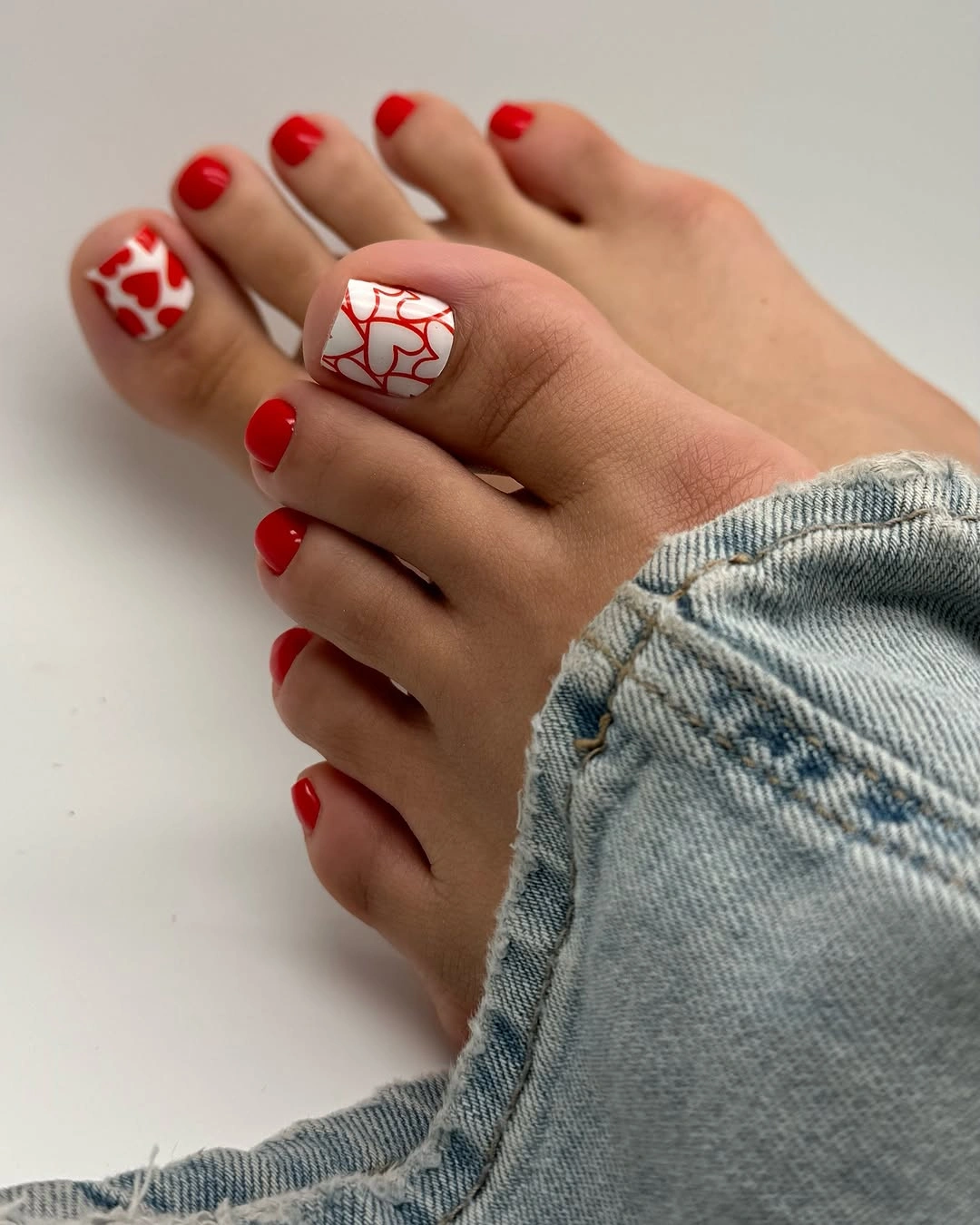 rich fall toe nails colors 2026 Cherry Red with Heart Details