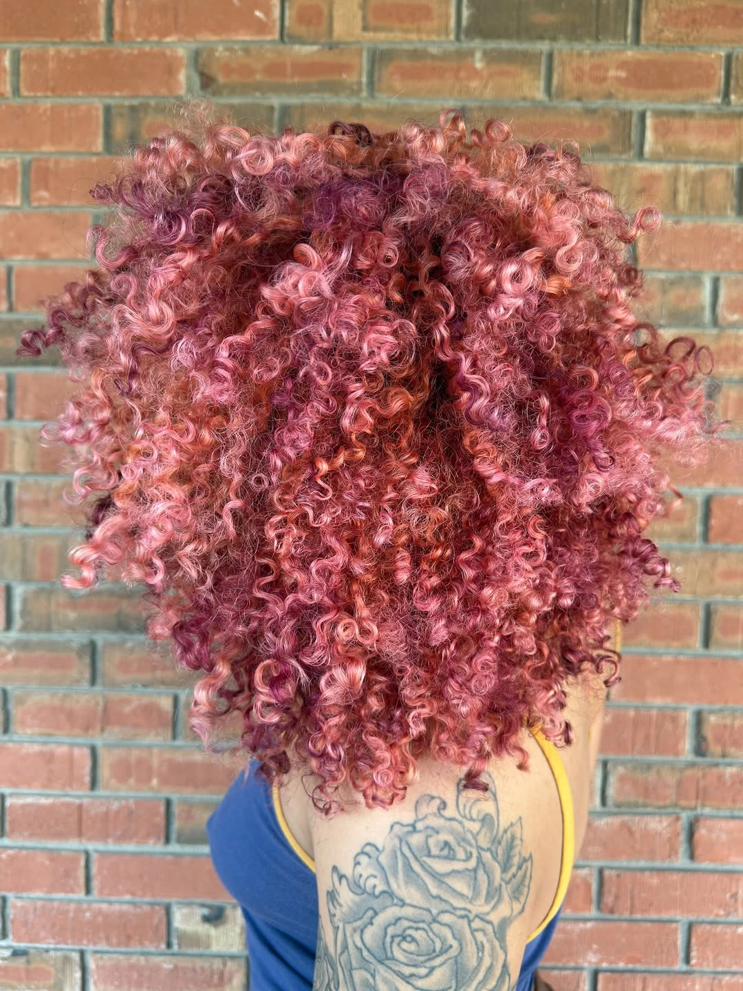rich october hair colour ideas 2026 Rosy Copper Curls With Major Volume