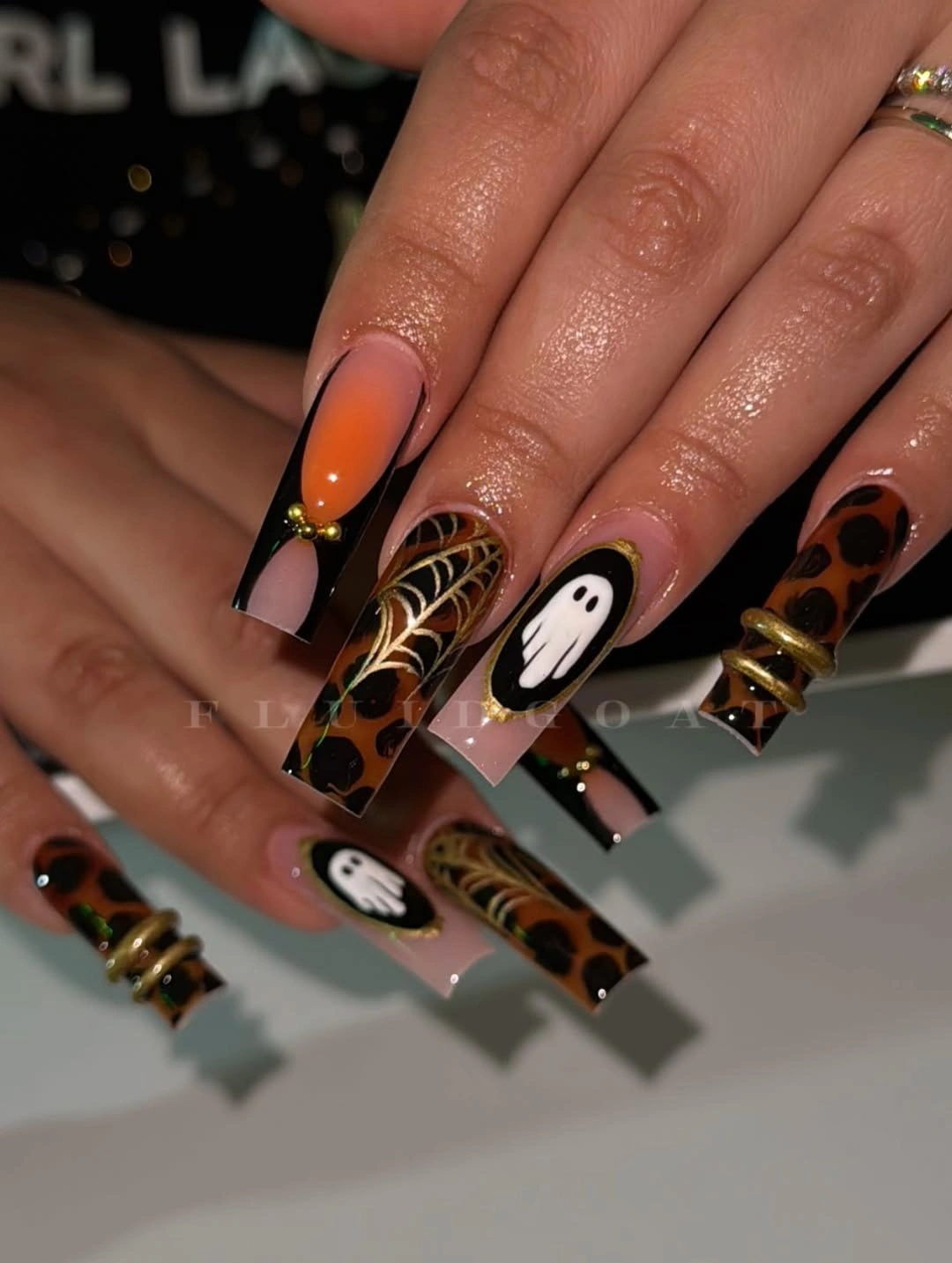 spooky halloween nail art 2026 Leopard Glam With Tiny Ghosts and Golden Details