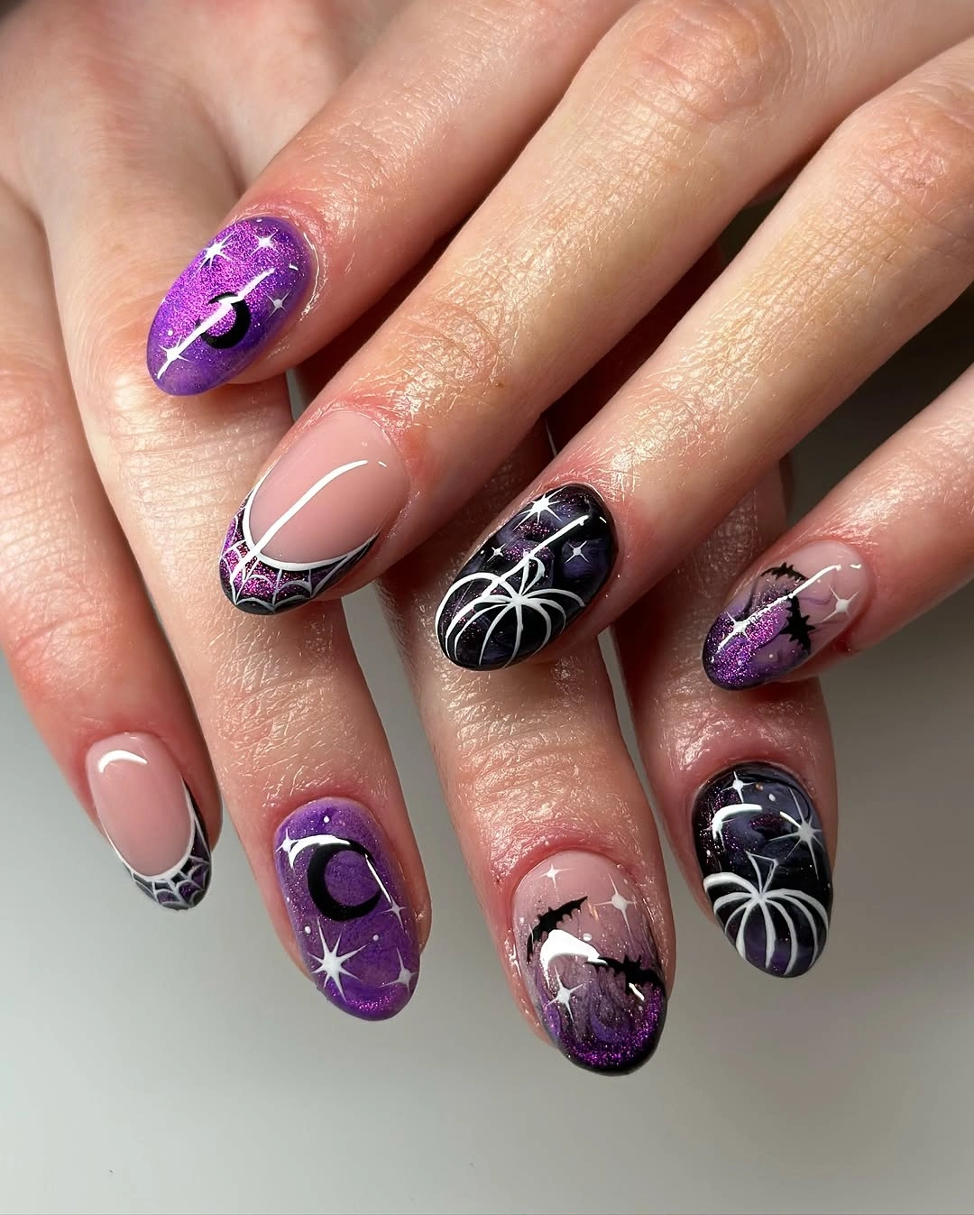 spooky halloween nail art 2026 Cosmic Purple Halloween Nails