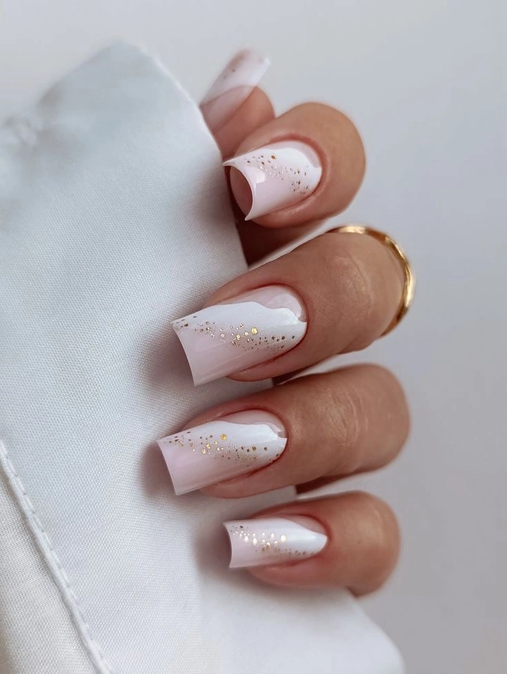 stylish fall gel nails ideas 2026 Milky White Nails With Golden Flecks