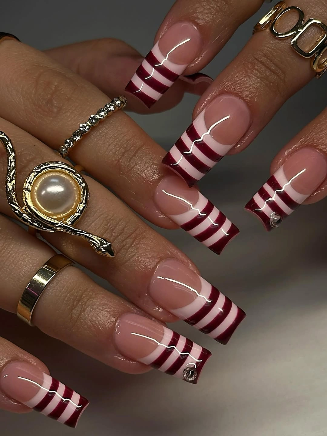 stylish fall nail designs square shape 2026 Burgundy Striped French Tips With Graphic Style
