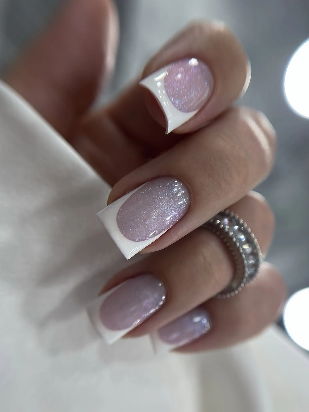 stylish fall nail designs square shape 2026 Soft Shimmer French That Makes Classic White Feel New Again