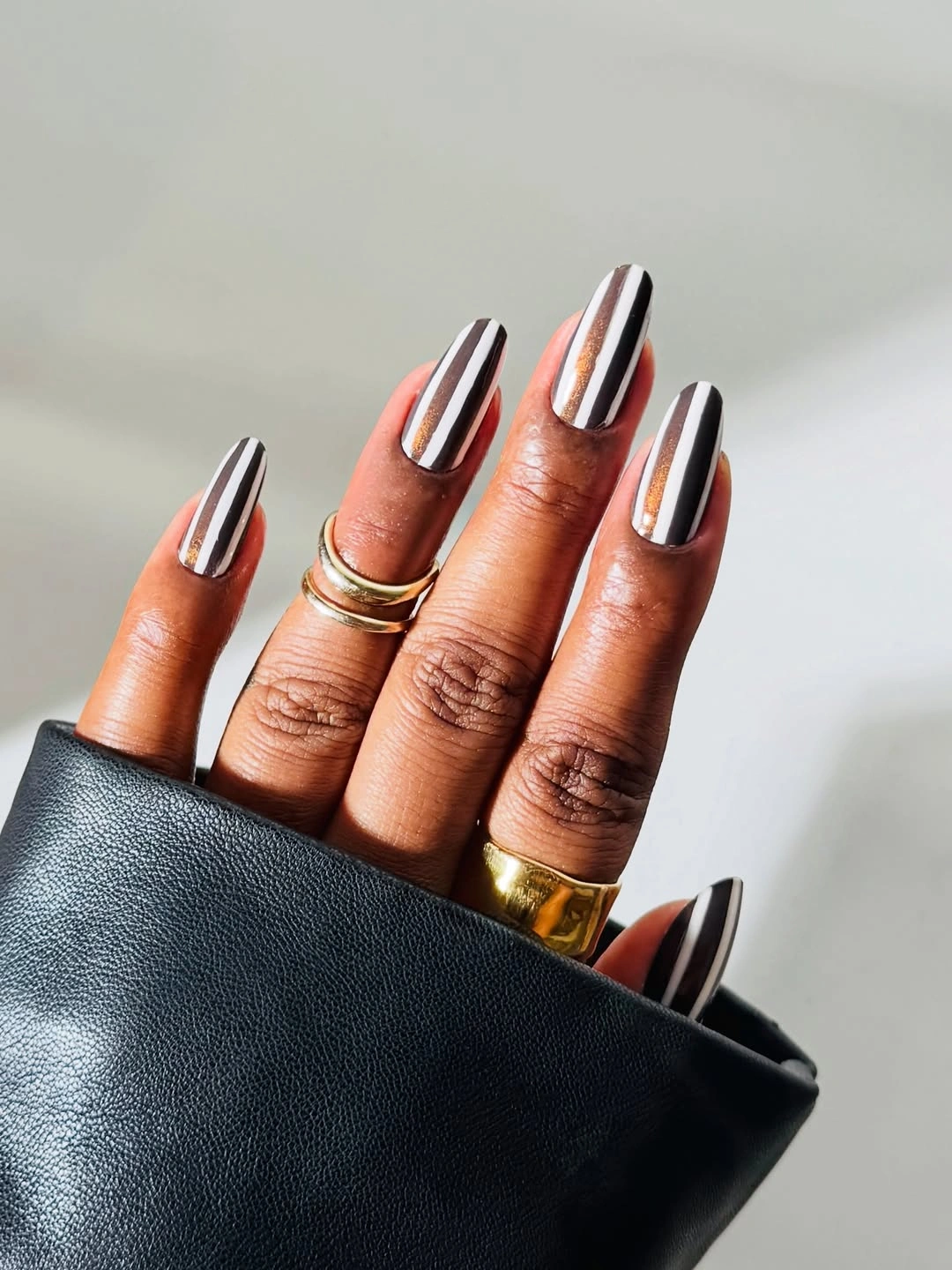 stylish fall nails for brown skin tone Chrome Stripes With A Modern Edge
