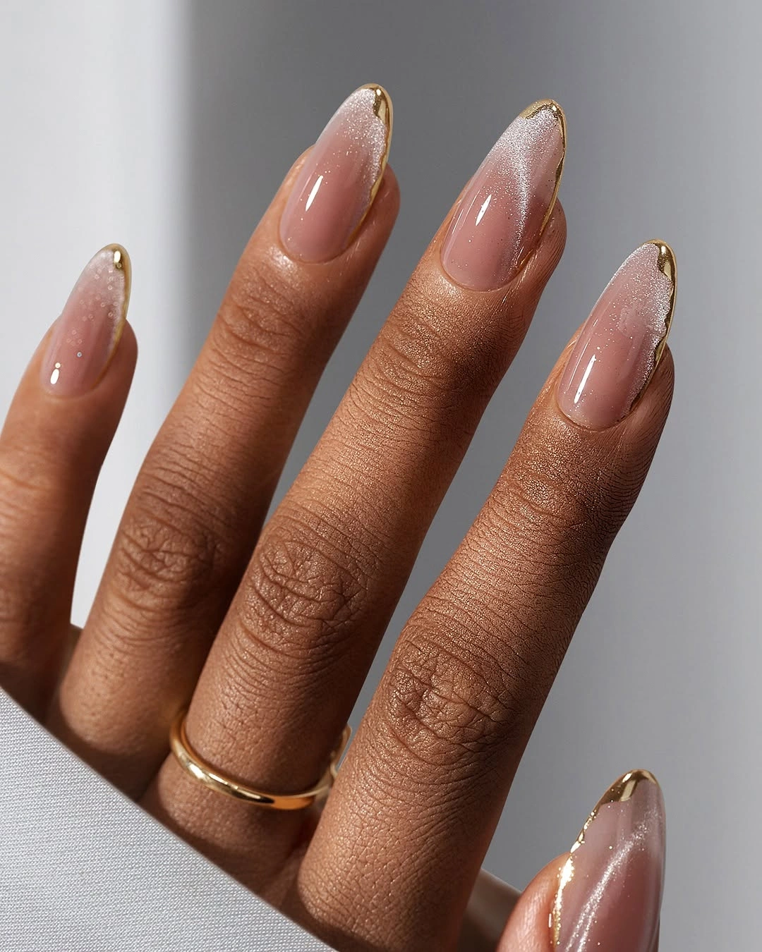 stylish fall nails for dark skin 2026 Golden Chrome French With Soft Pearl Glow