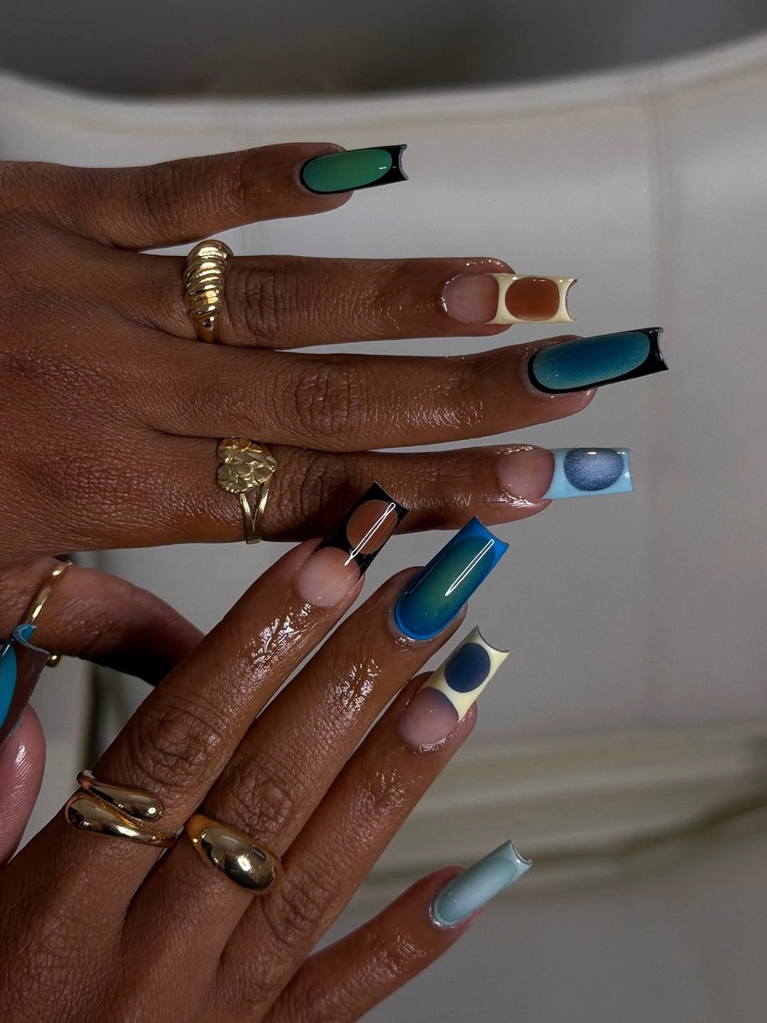 stylish fall nails for dark skin 2026 Modern Graphic Blue Nails With Negative Space