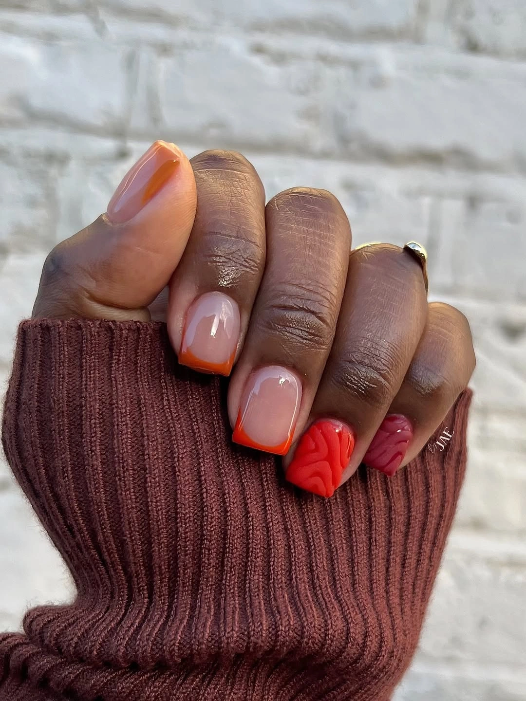 stylish fall nails for dark skin 2026 Burnt Orange French With Cozy Autumn Texture