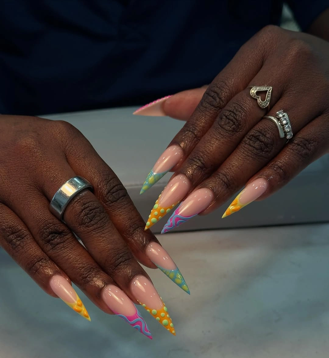 stylish fall nails for dark skin 2026 Playful Color Pop Stiletto Nails