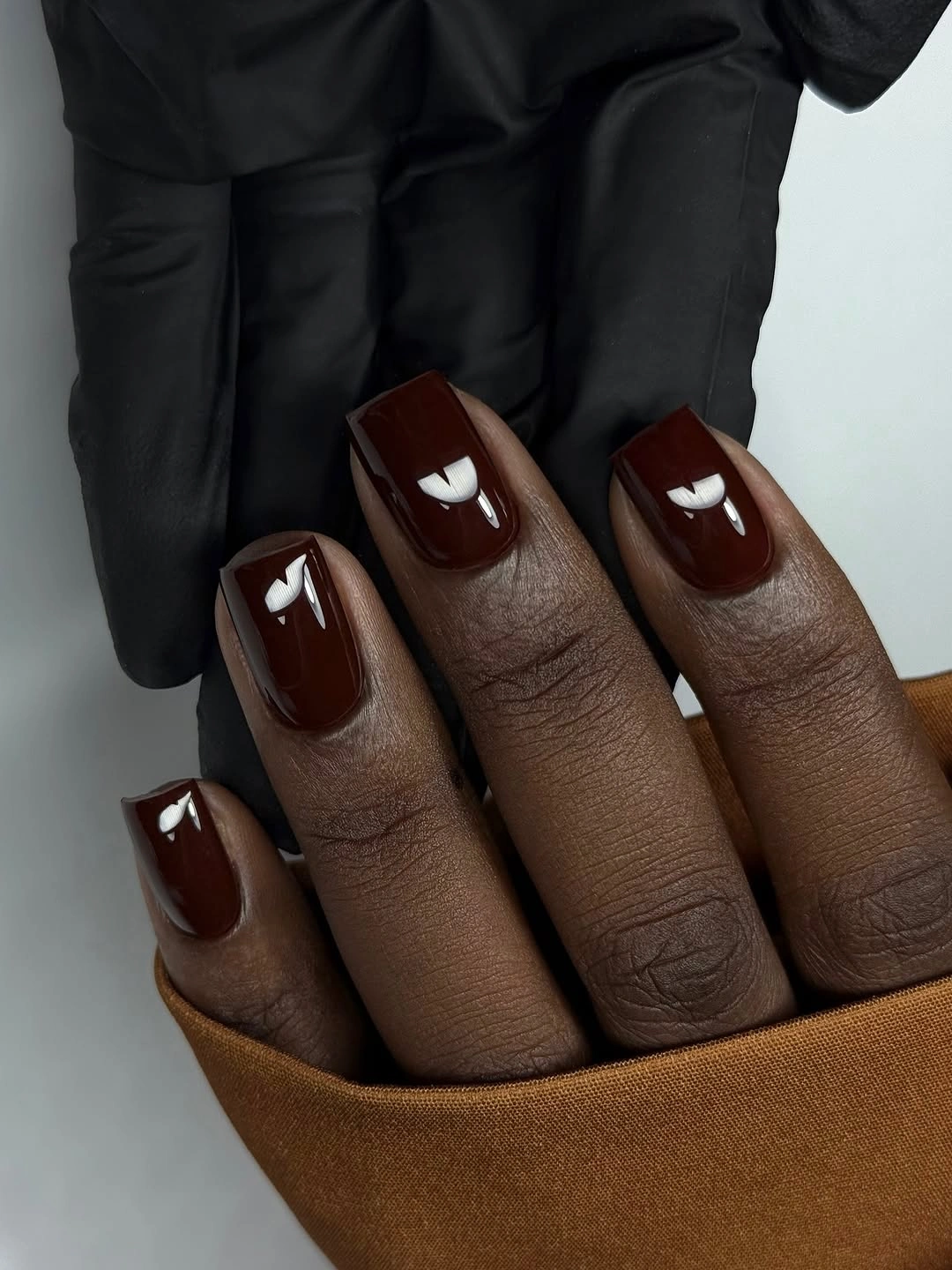 stylish fall nails for dark skin 2026 Deep Chocolate Gloss Nails
