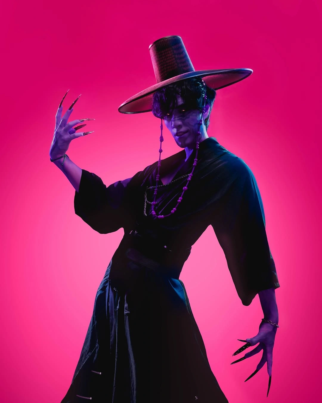 stylish halloween costume ideas 2026 Shadow Witch in Sculptural Black