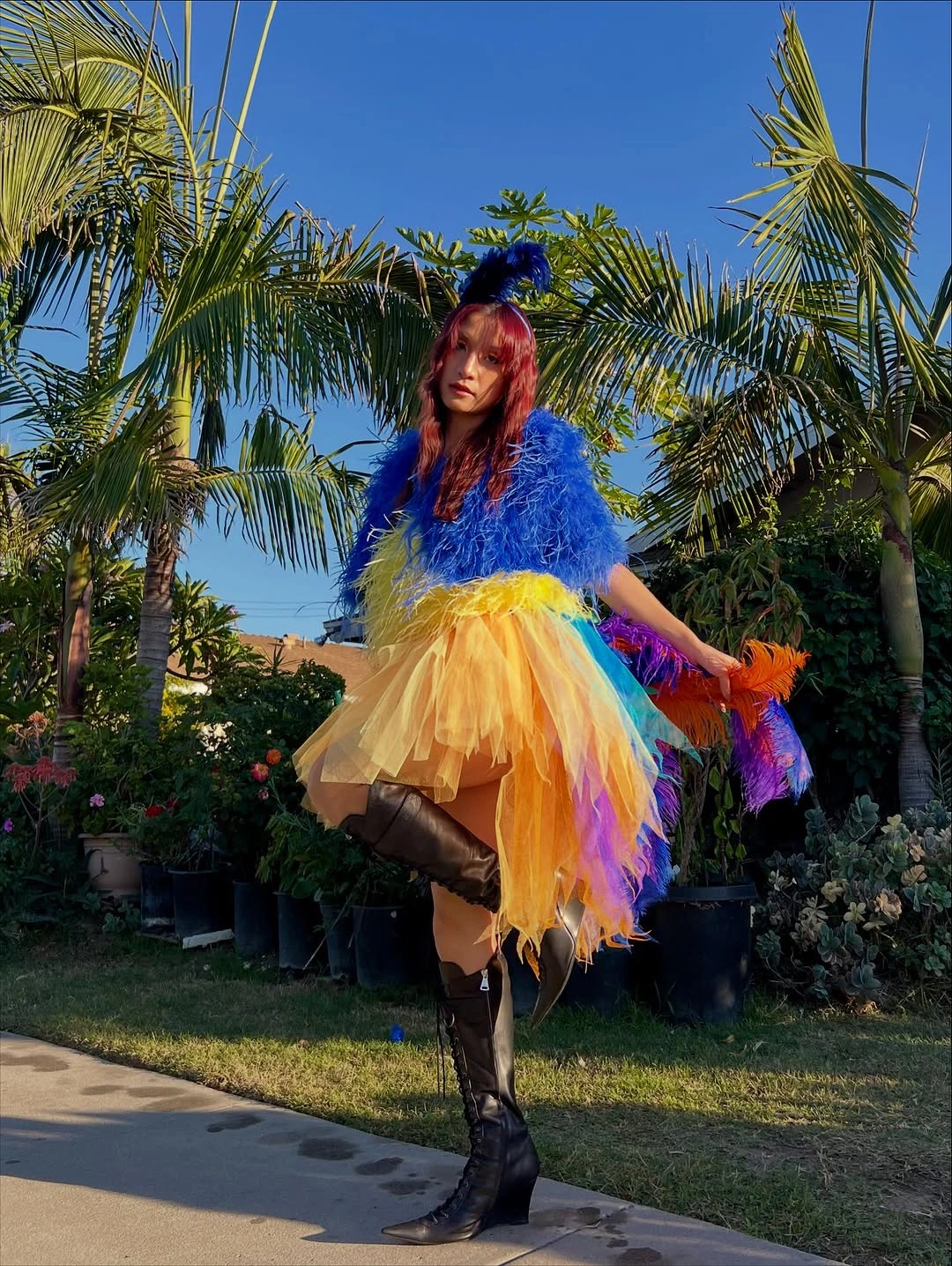 stylish halloween costume ideas 2026 Technicolor Bird With Feathered Drama