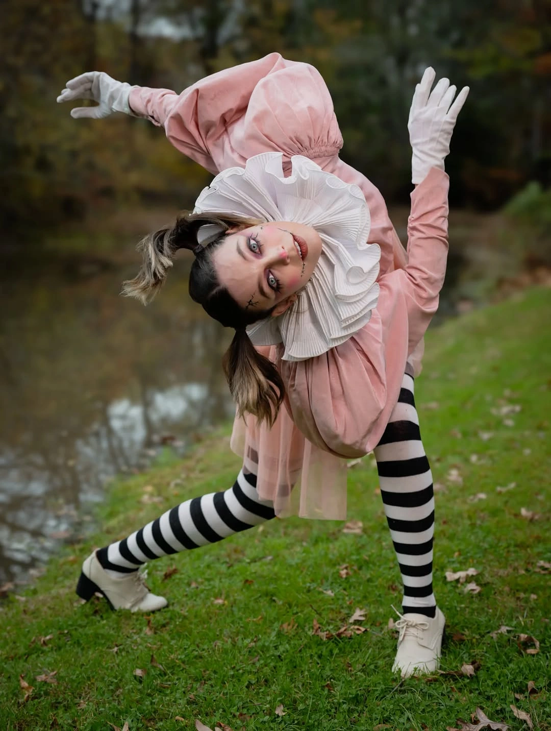 stylish halloween costume ideas 2026 Pink Pierrot With Striped Tights
