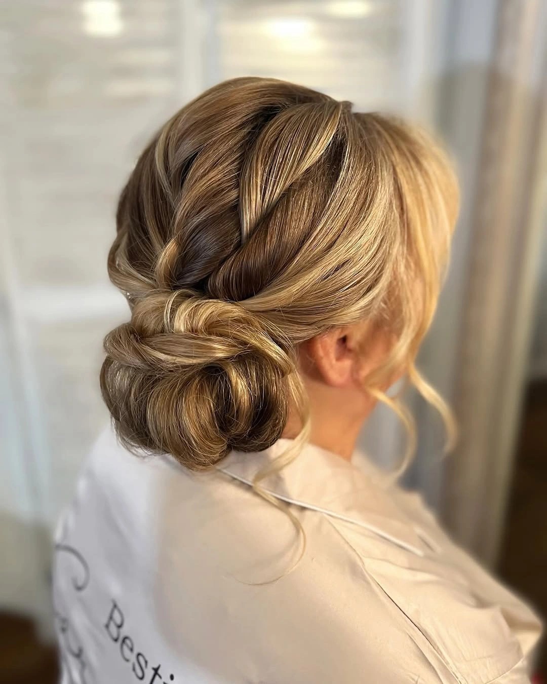 stylish middle parting hairstyles Soft Sculpted Updo With A Refined Middle Part