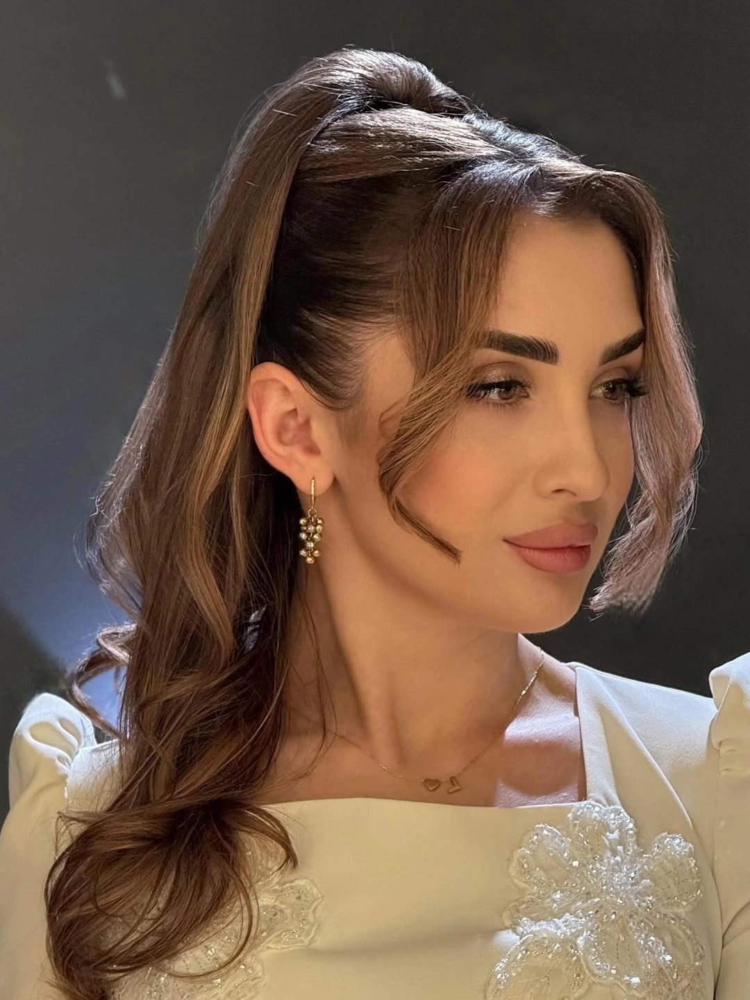 stylish middle parting hairstyles Polished Ponytail With Soft Face-Framing Pieces