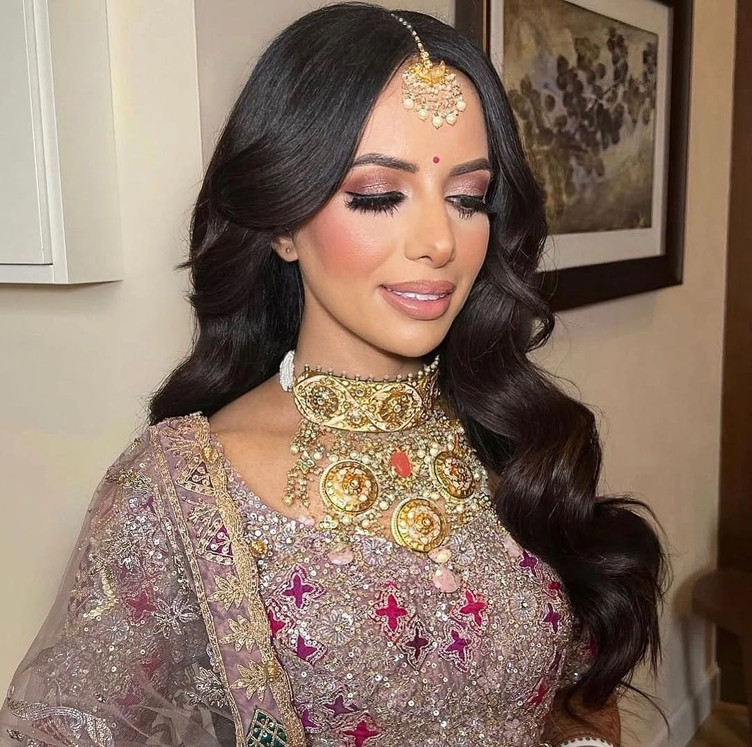 stylish middle parting hairstyles Glossy Black Waves With A Dramatic Center Part