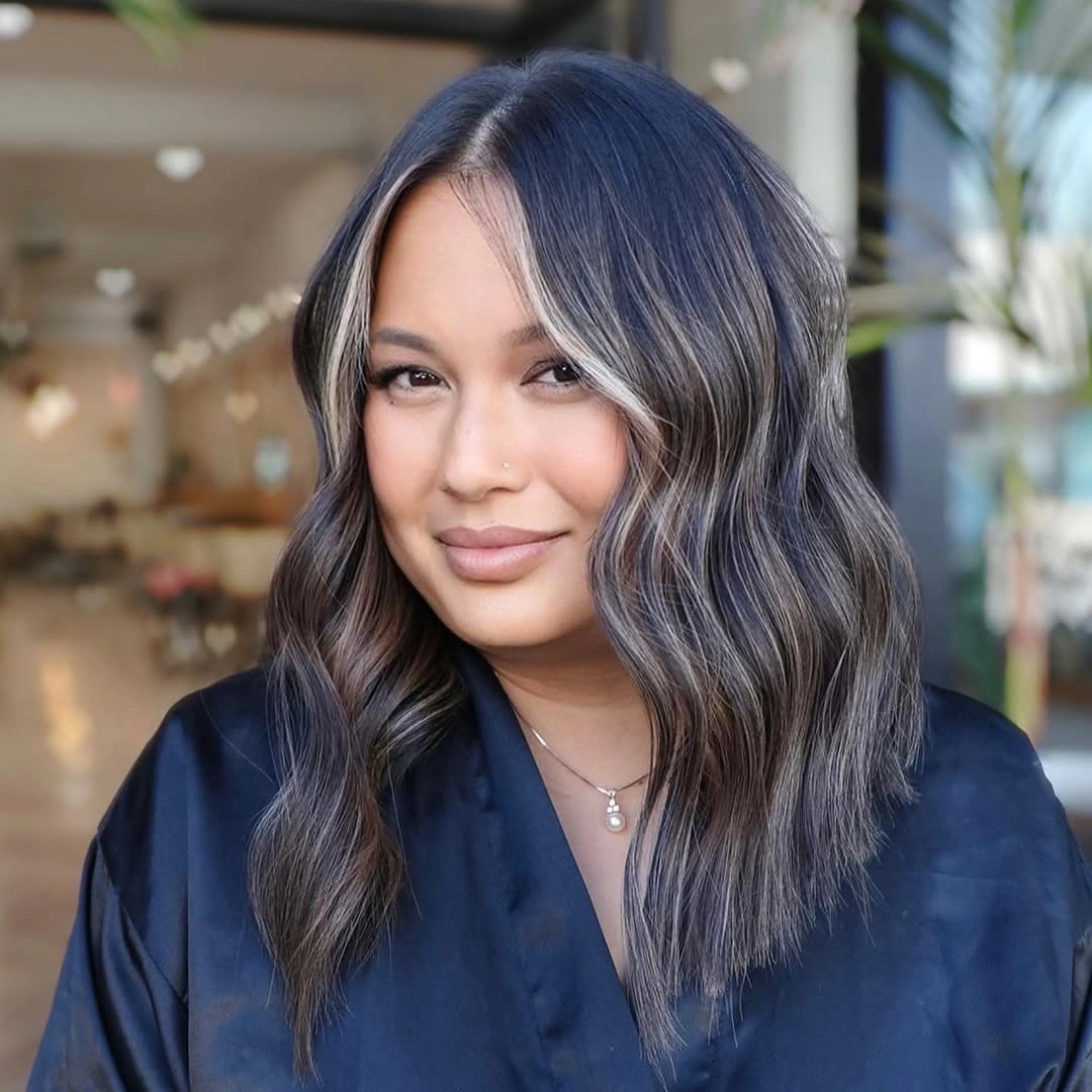 stylish middle parting hairstyles Soft Wavy Layers With A Natural Center Part