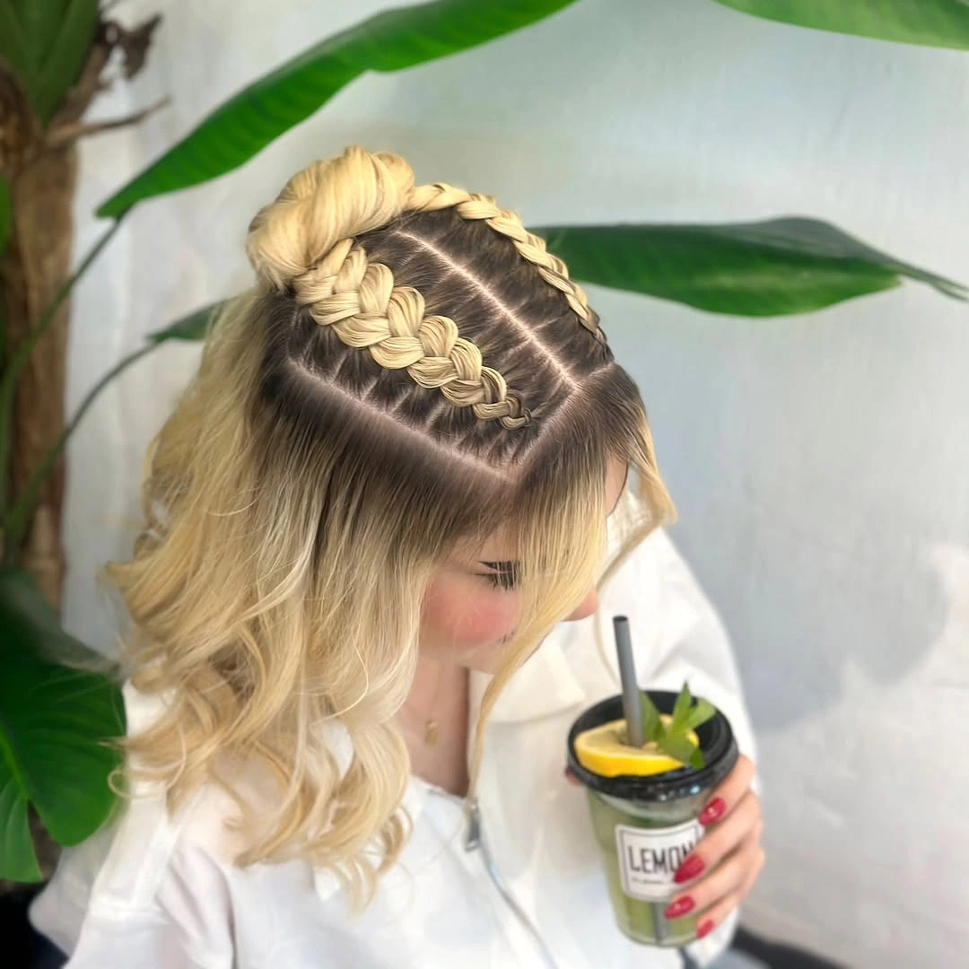 stylish middle parting hairstyles Braided Crown With Blonde Waves