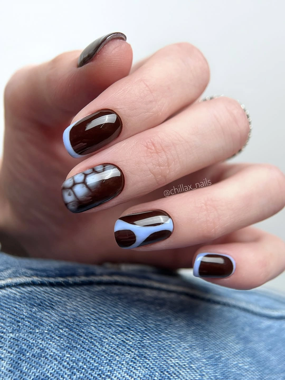 Trendy dark fall nails 2026 short brown nails with blue accents