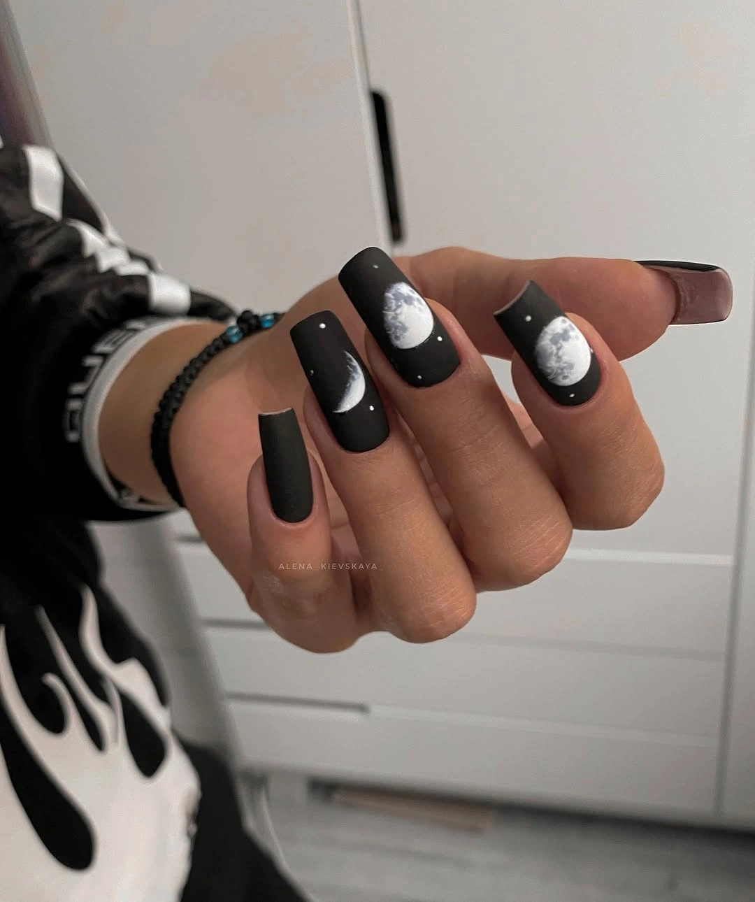 Trendy dark fall nails 2026 matte black moon nails