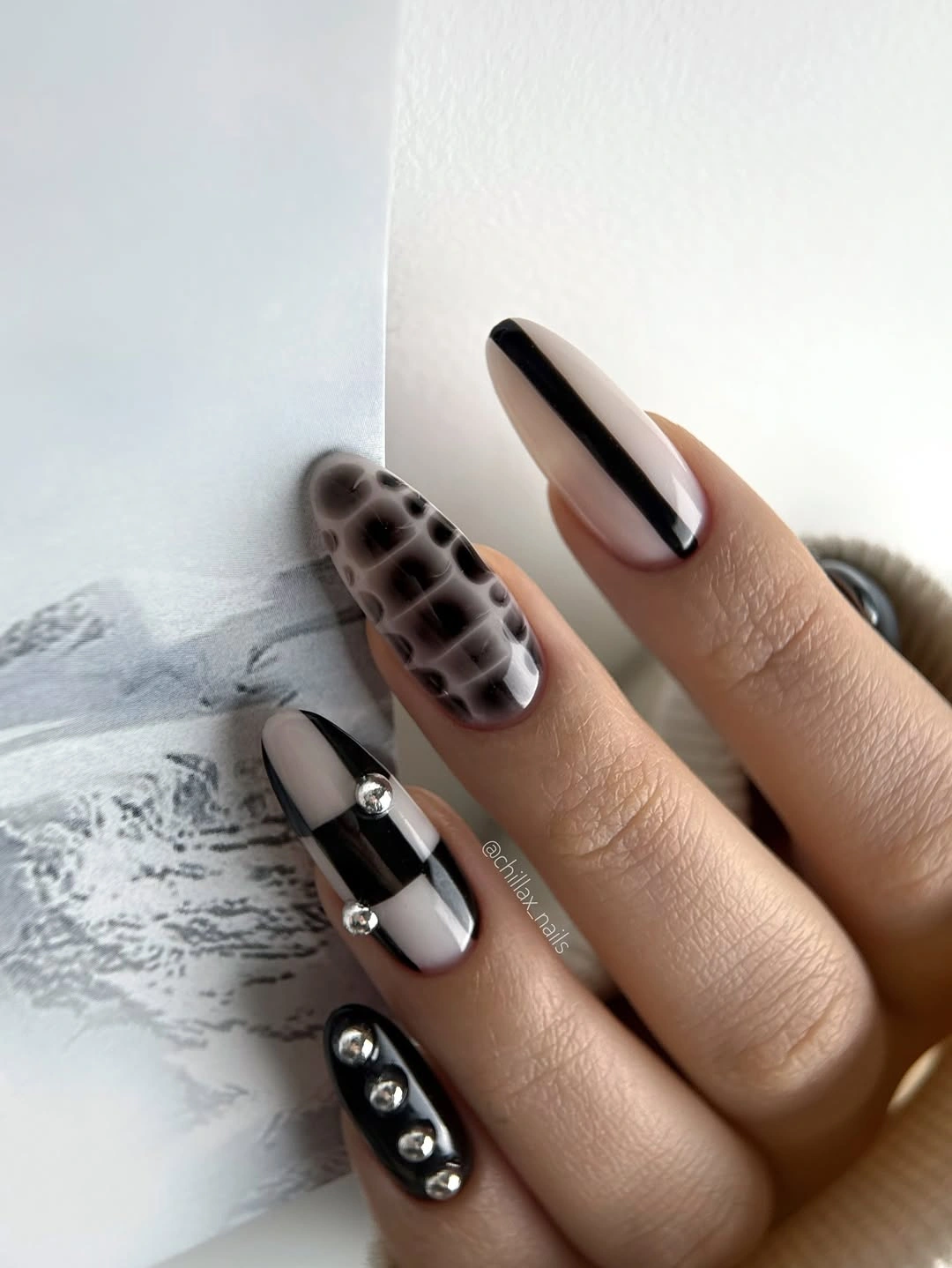 Trendy Dark Fall Nails 2026 Black White Leopard Almond Design