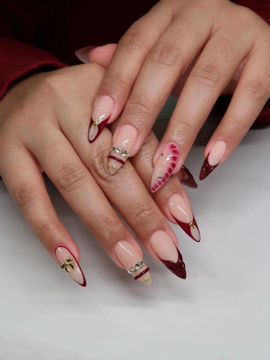trendy fall burgundy nails with design Elegant Burgundy French Tips With Gold Jewelry Details