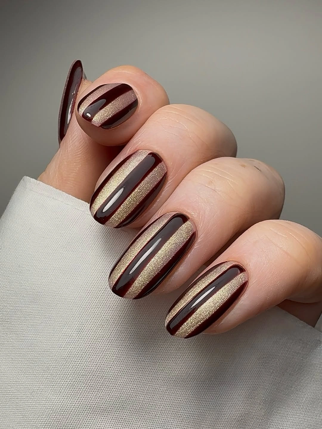 trendy fall burgundy nails with design Burgundy and Gold Glitter Nails for a Rich Autumn Finish