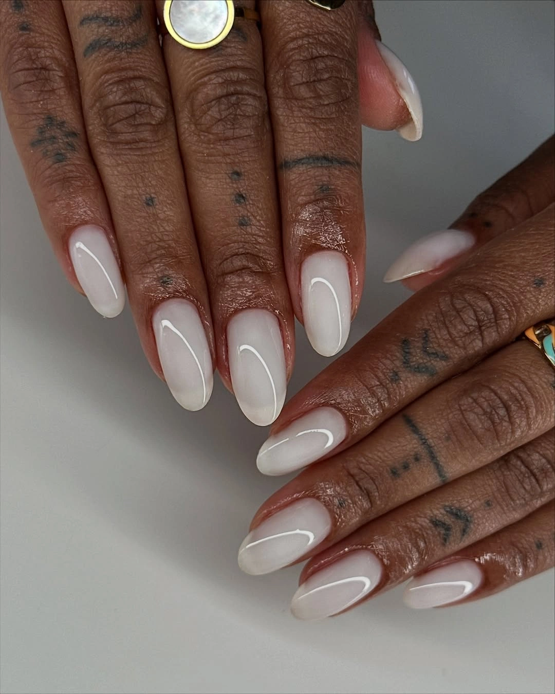 rich fall nails colors for dark skin milky white outlined almond nails
