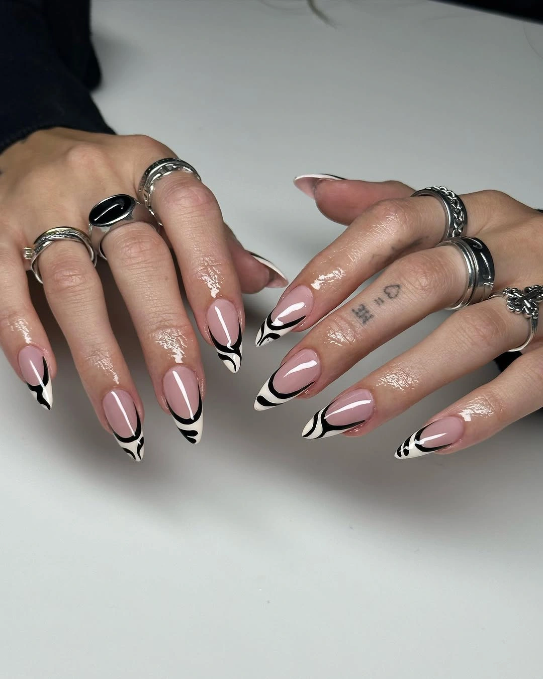 rich fall nails colors for dark skin black white graphic almond tips