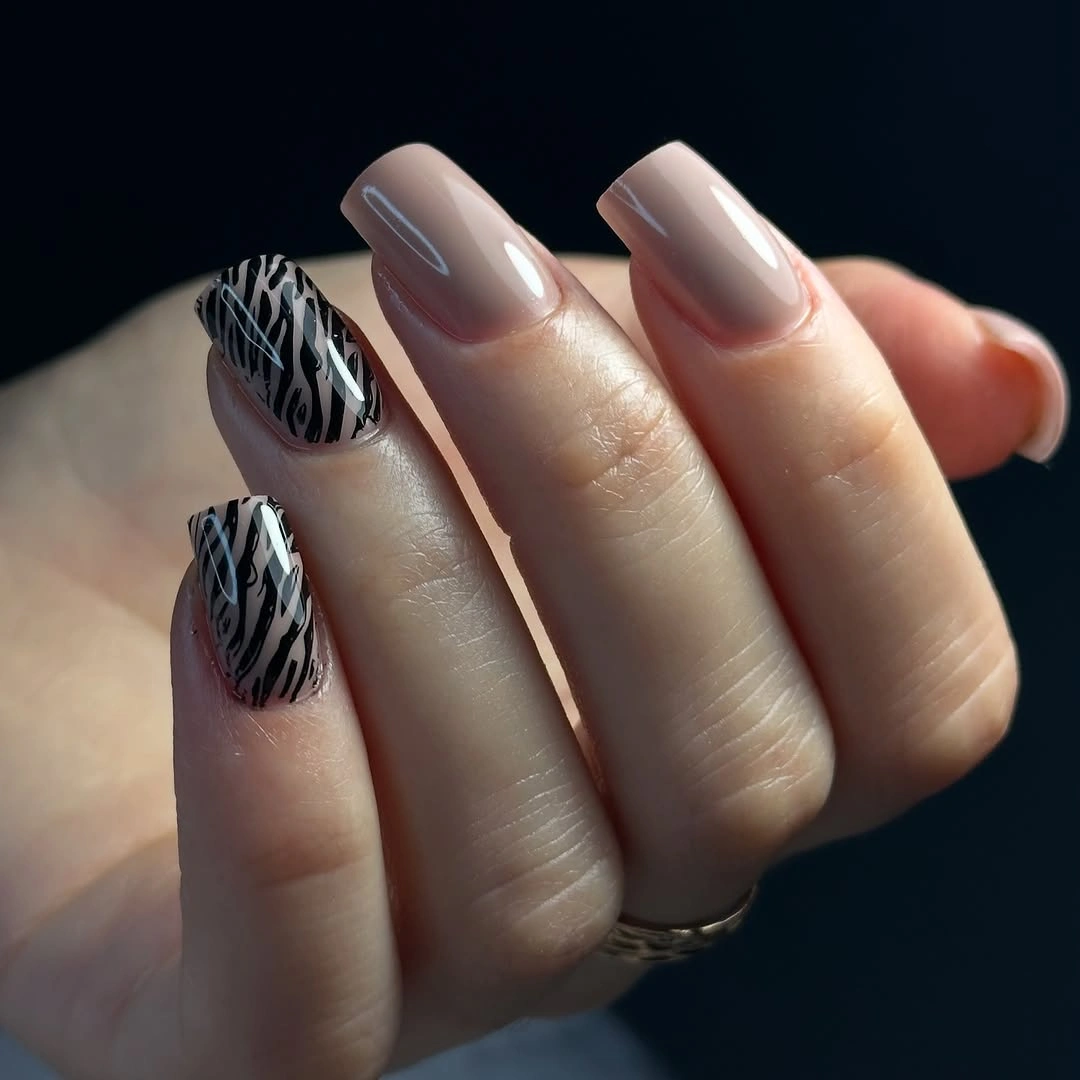 trendy fall nails for pale skin 2026 Soft Nude With Zebra Accents