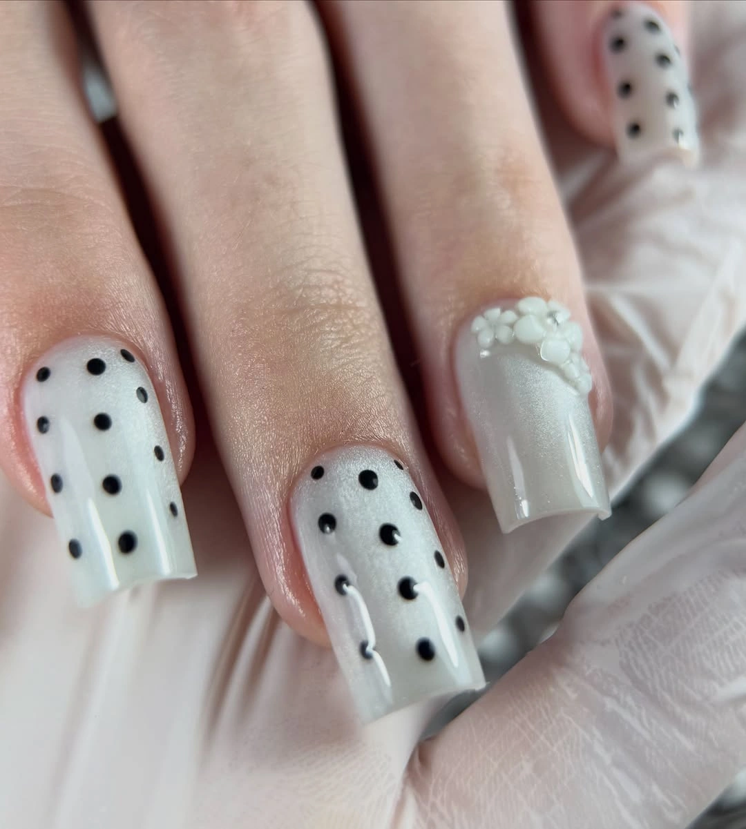 trendy fall nails for pale skin 2026 - Milky White Nails With Playful Black Dots