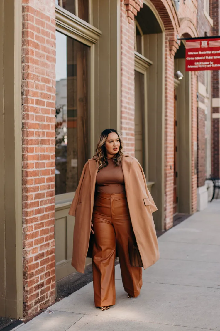 Effortless Camel Coat Draped Over Casual Brown Ensemble — Winter Outfits for Curvy Women