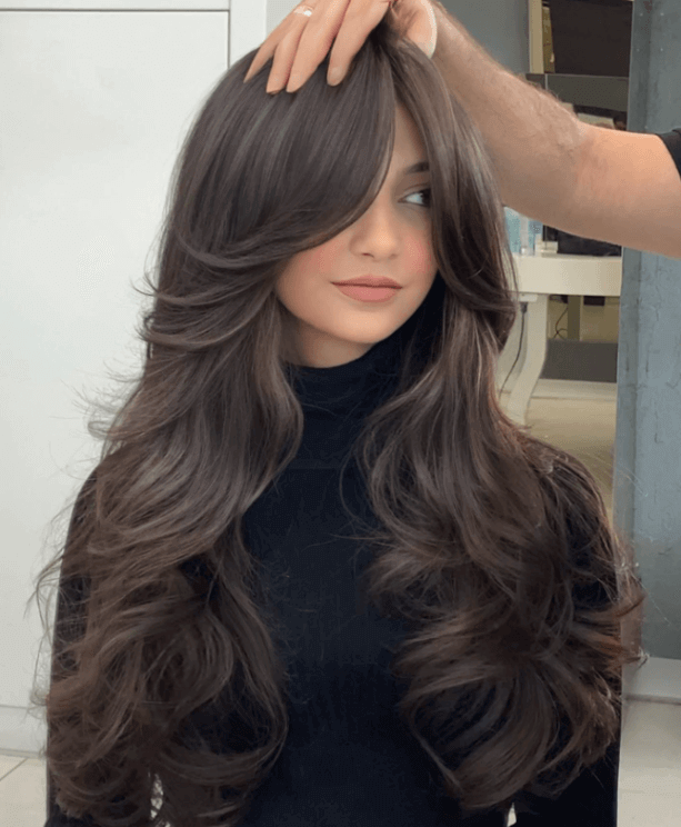 Voluminous Mid-Back Layers — Winter Haircuts for Thick Hair
