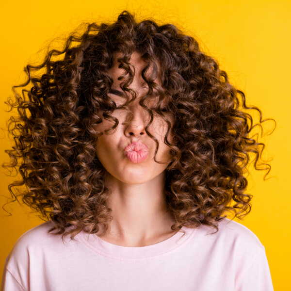 Medium Brown With Caramel Highlights Visual Idea — Winter Haircuts for Curly Hair