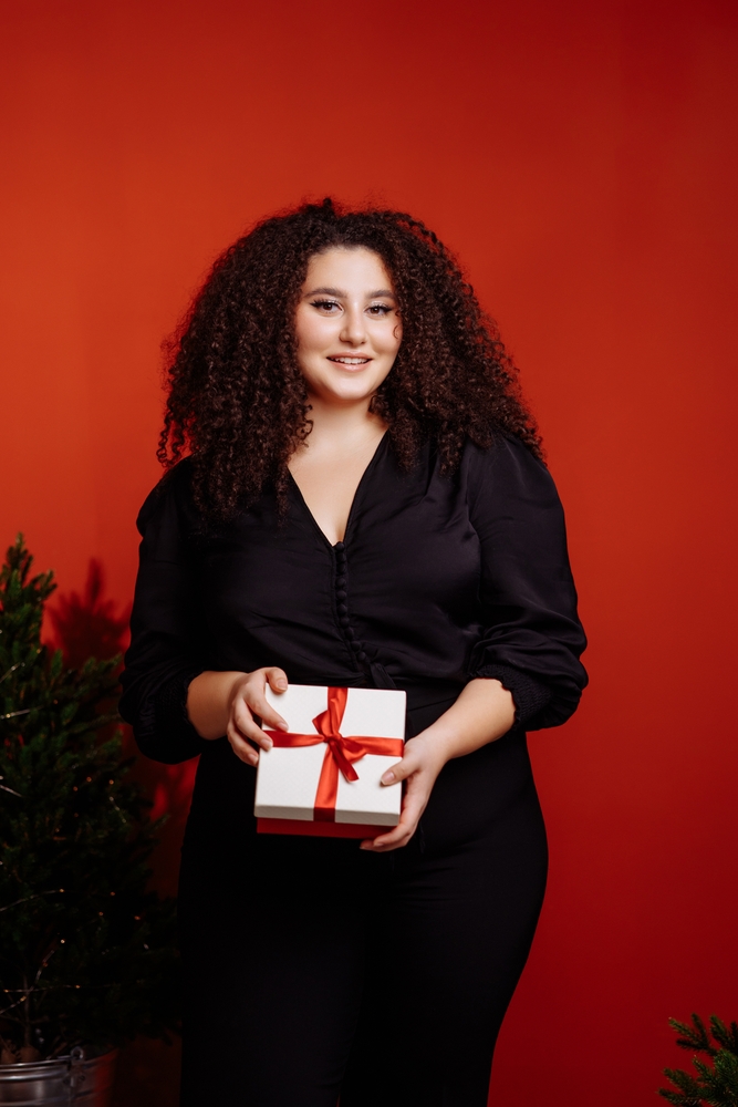 Satin-Like Black Top and Trousers for a Festive Touch — Winter Outfits for Curvy Women