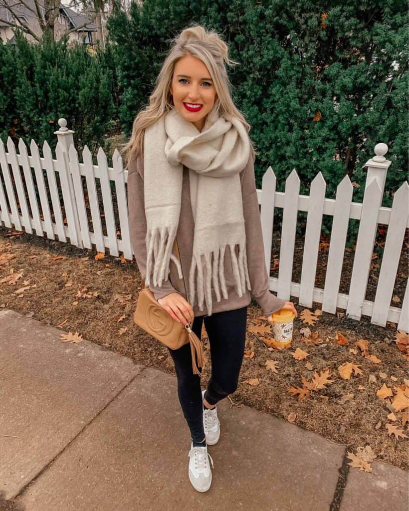 Beige Knit Sweater and Black Leggings with a Fringed Scarf Beige Knit Sweater and Black Leggings with a Fringed Scarf β Casual Winter Outfits