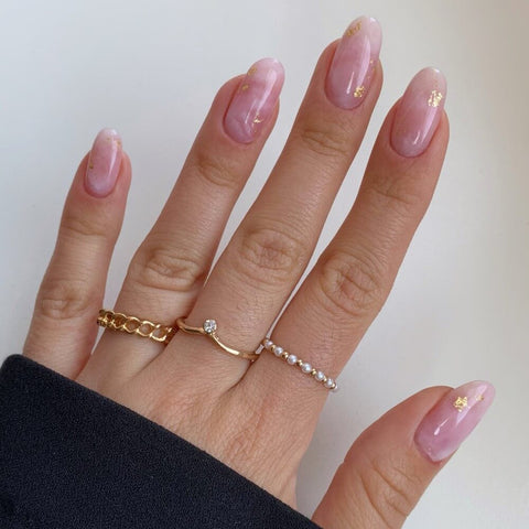 Sheer Pink Oval Nails with Gold Foil Flakes Sheer Pink Oval Nails with Gold Foil Flakes β Winter Oval Nails