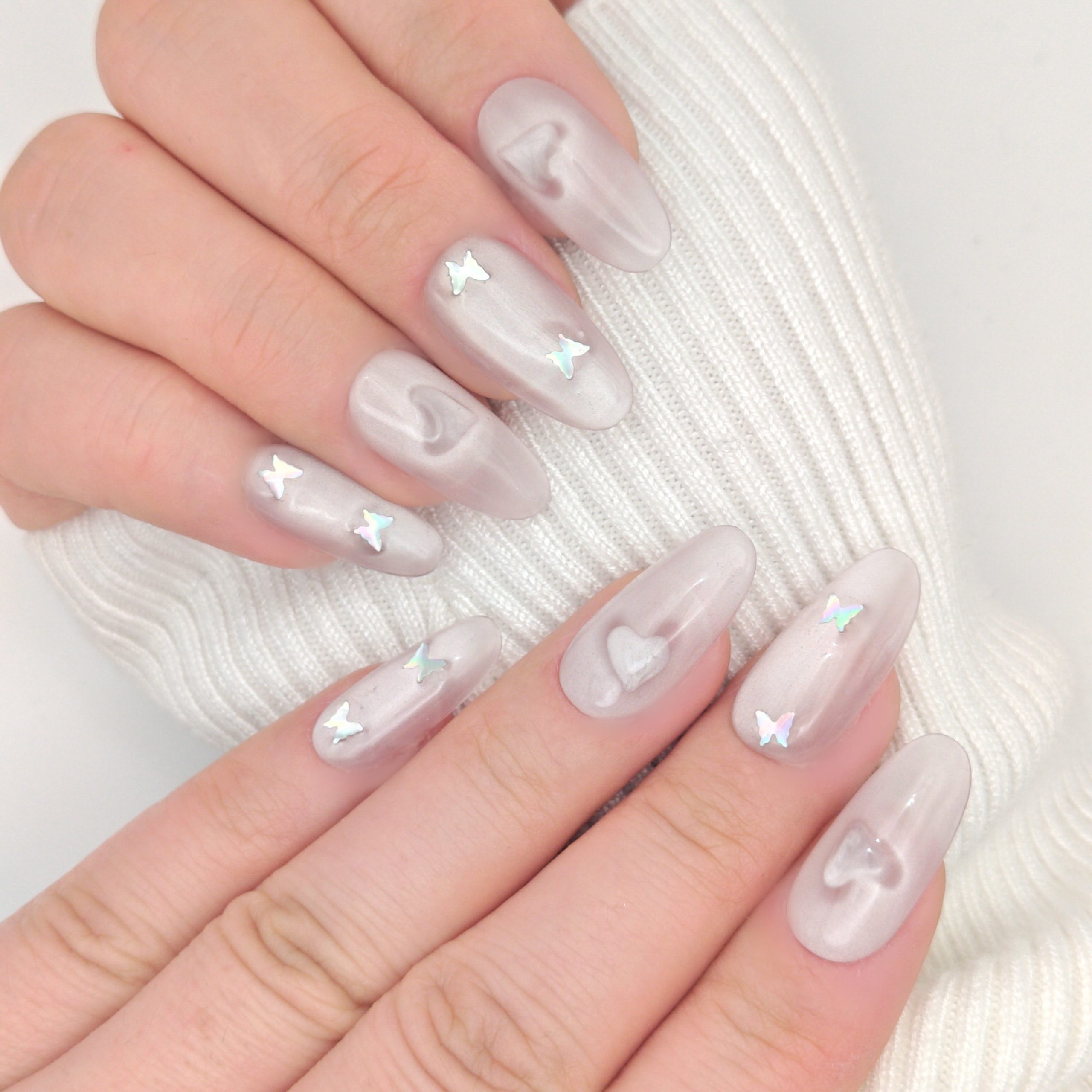 Pale Pink Matte Shimmer Oval Nails with Charms Pale Pink Matte Shimmer Oval Nails with Charms β Winter Oval Nails