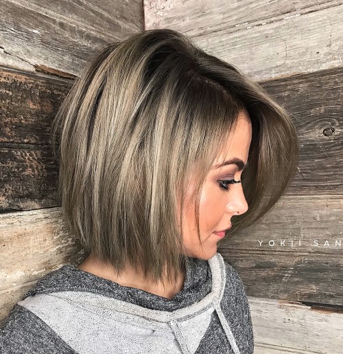 Chin Length Bob With Side Swept Bangs — Winter Haircuts for Thick Hair