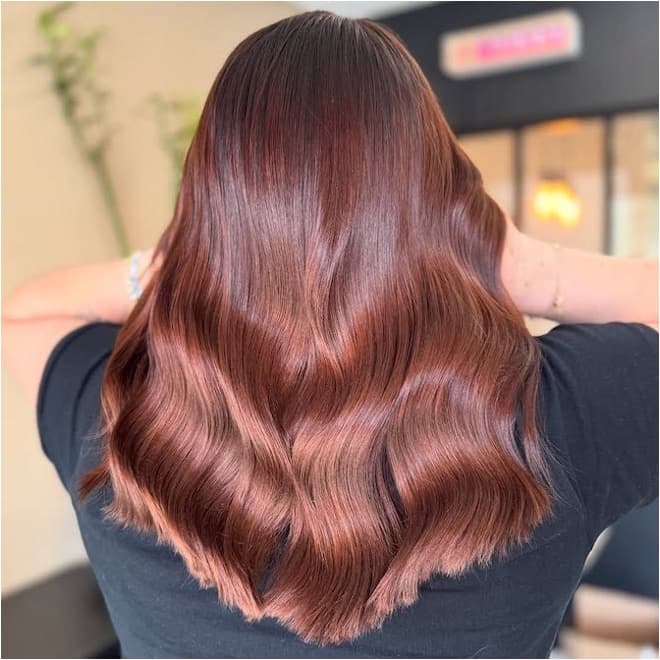 Vibrant Copper Red Waves Vibrant Copper Red Waves β Winter Haircuts for Wavy Hair