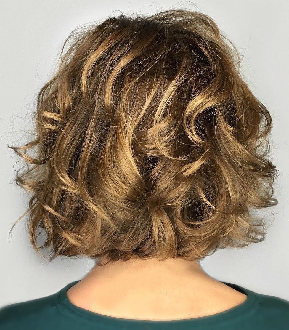 Layered Bob With Warm Highlights Layered Bob With Warm Highlights β Winter Haircuts for Wavy Hair
