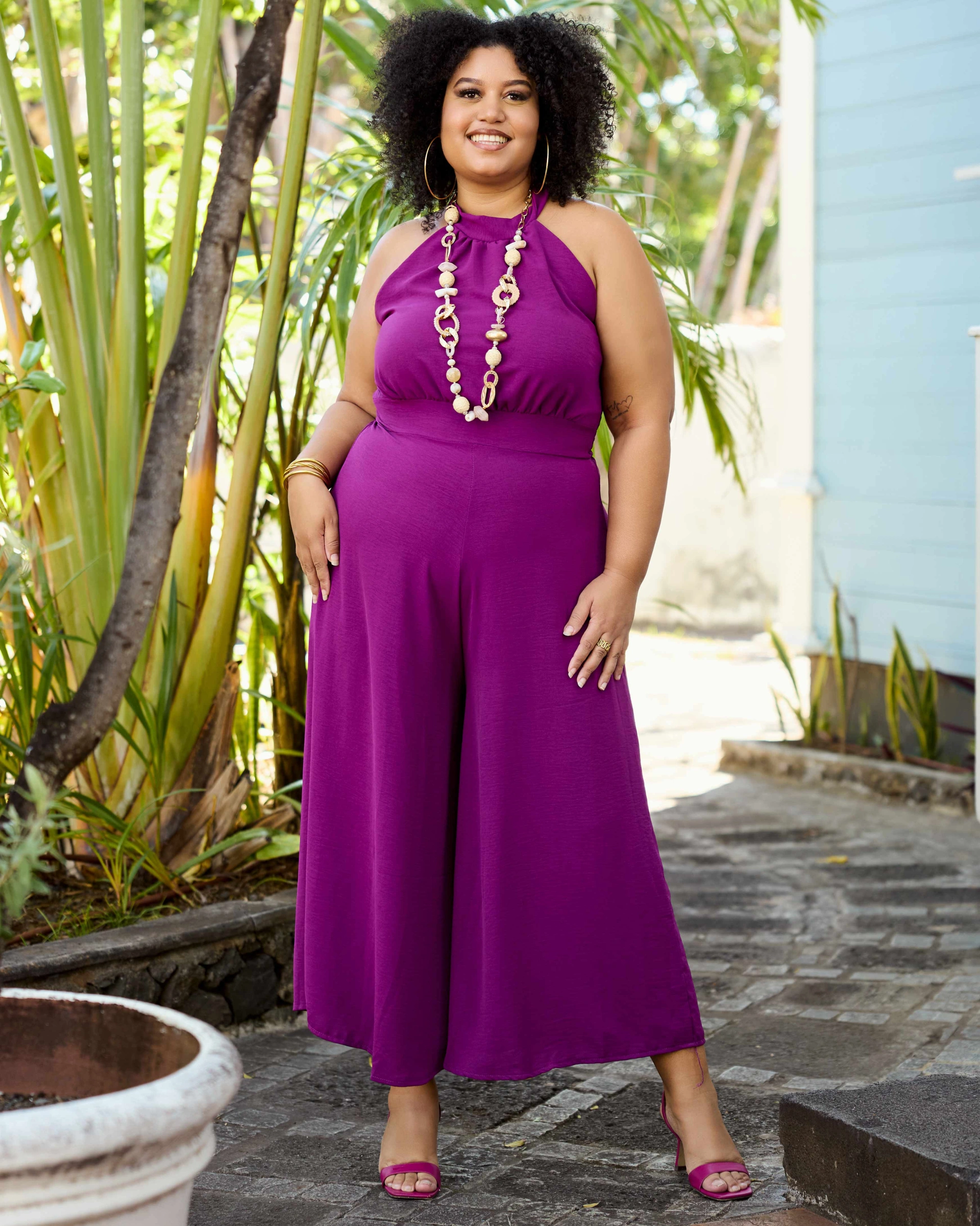 Purple Halterneck Jumpsuit with Statement Necklace for Casual Flair — Winter Outfits for Curvy Women