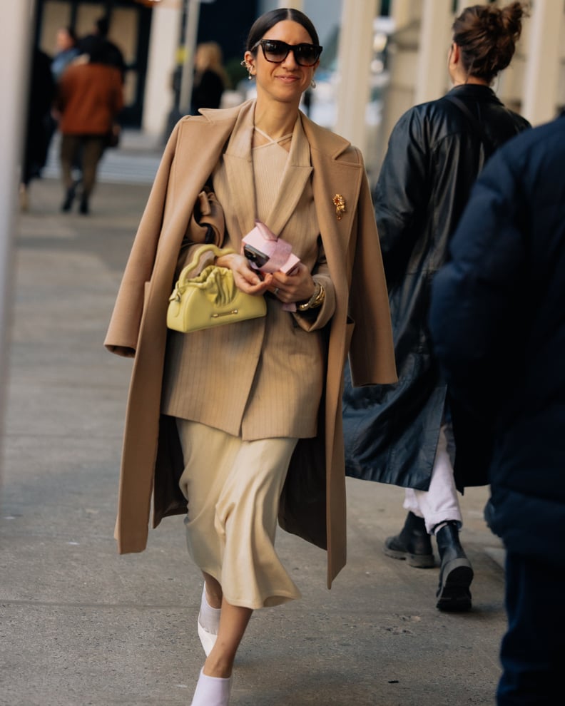 Effortless Layering with a Camel Coat Over a Pinstripe Suit Effortless Layering with a Camel Coat Over a Pinstripe Suit β Winter Work Outfits