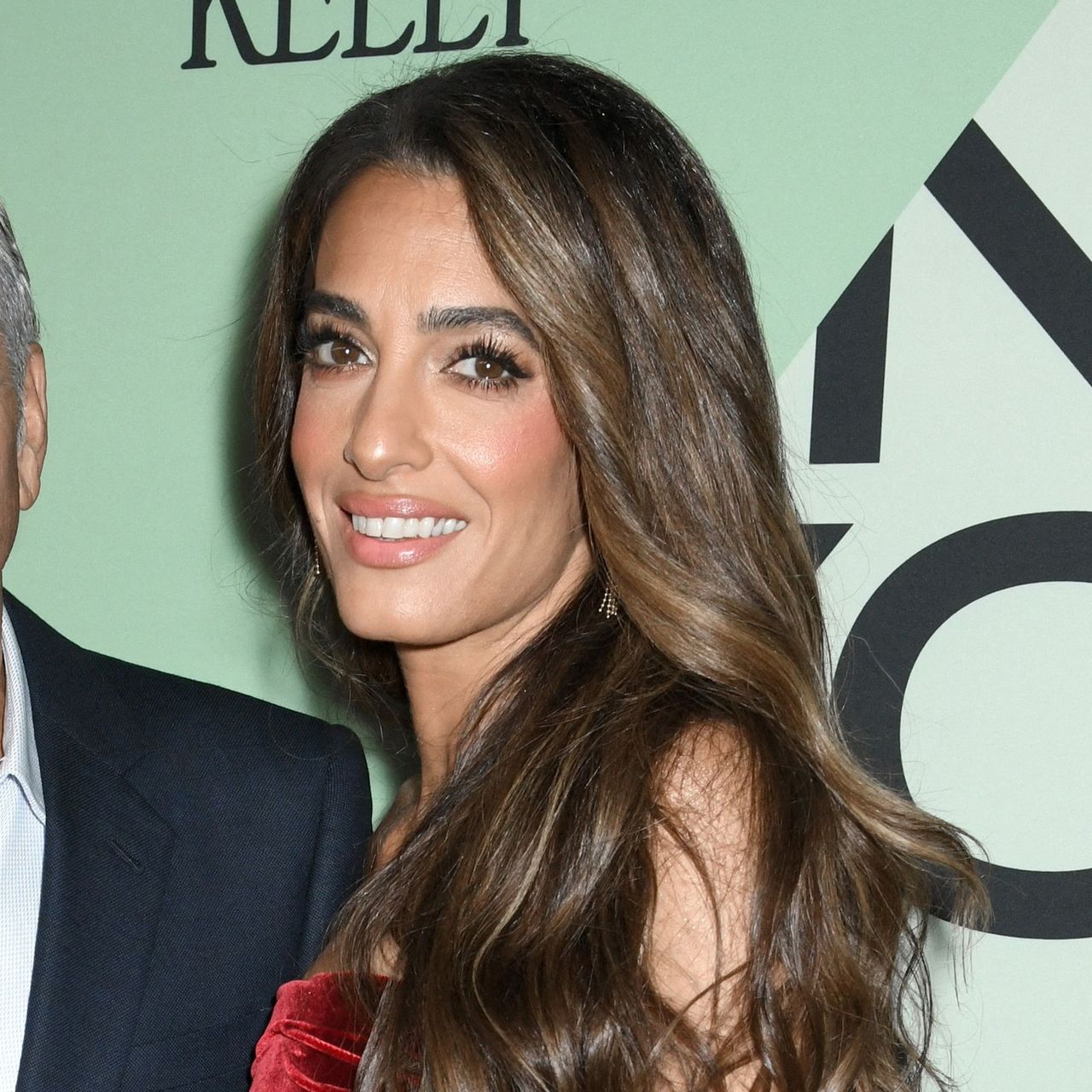 Mid-Back Waves With Side Swept Bangs — Winter Haircuts for Thick Hair