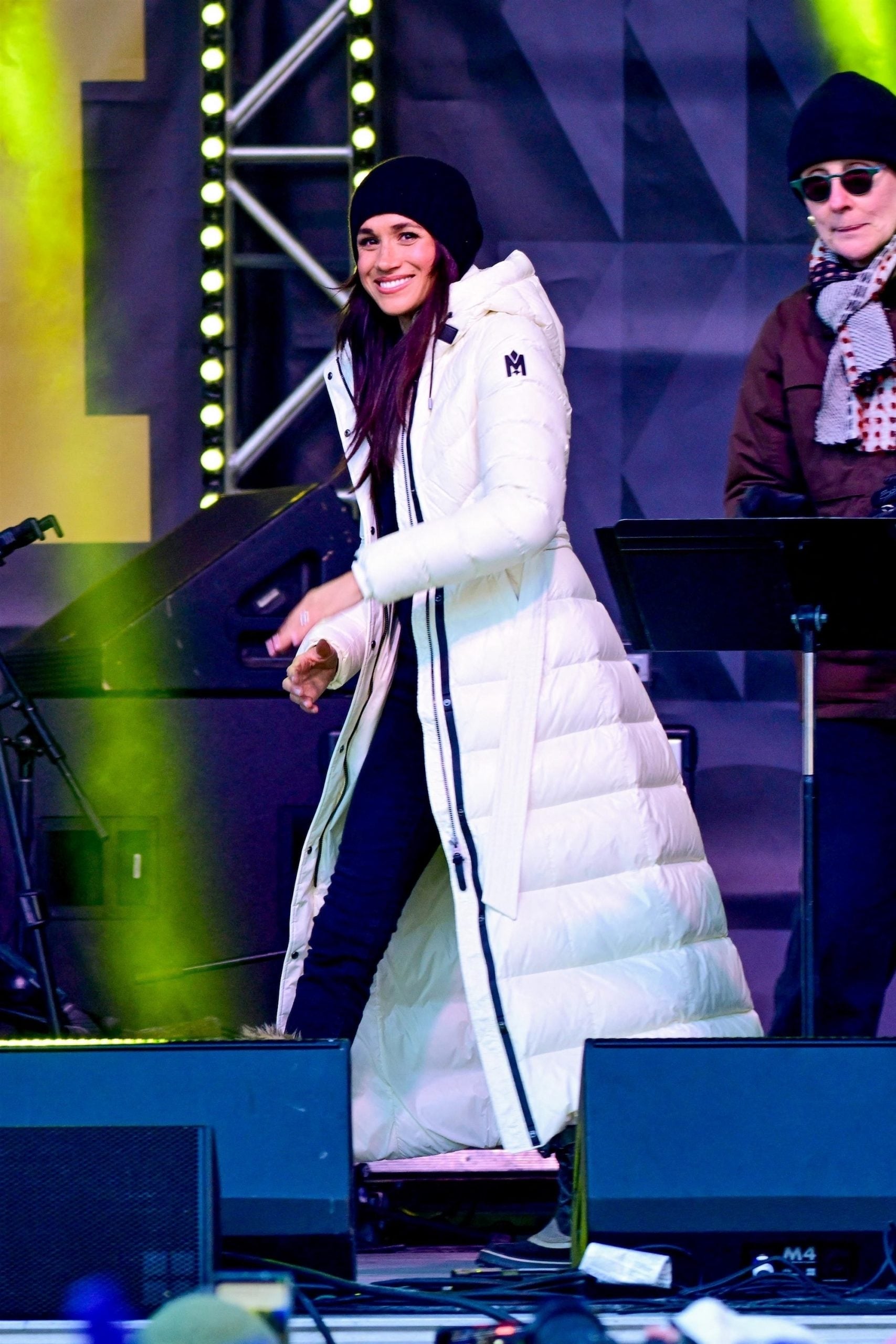 Long White Puffer Coat with Black Trim and Beanie — Winter Puffer Jacket Outfits