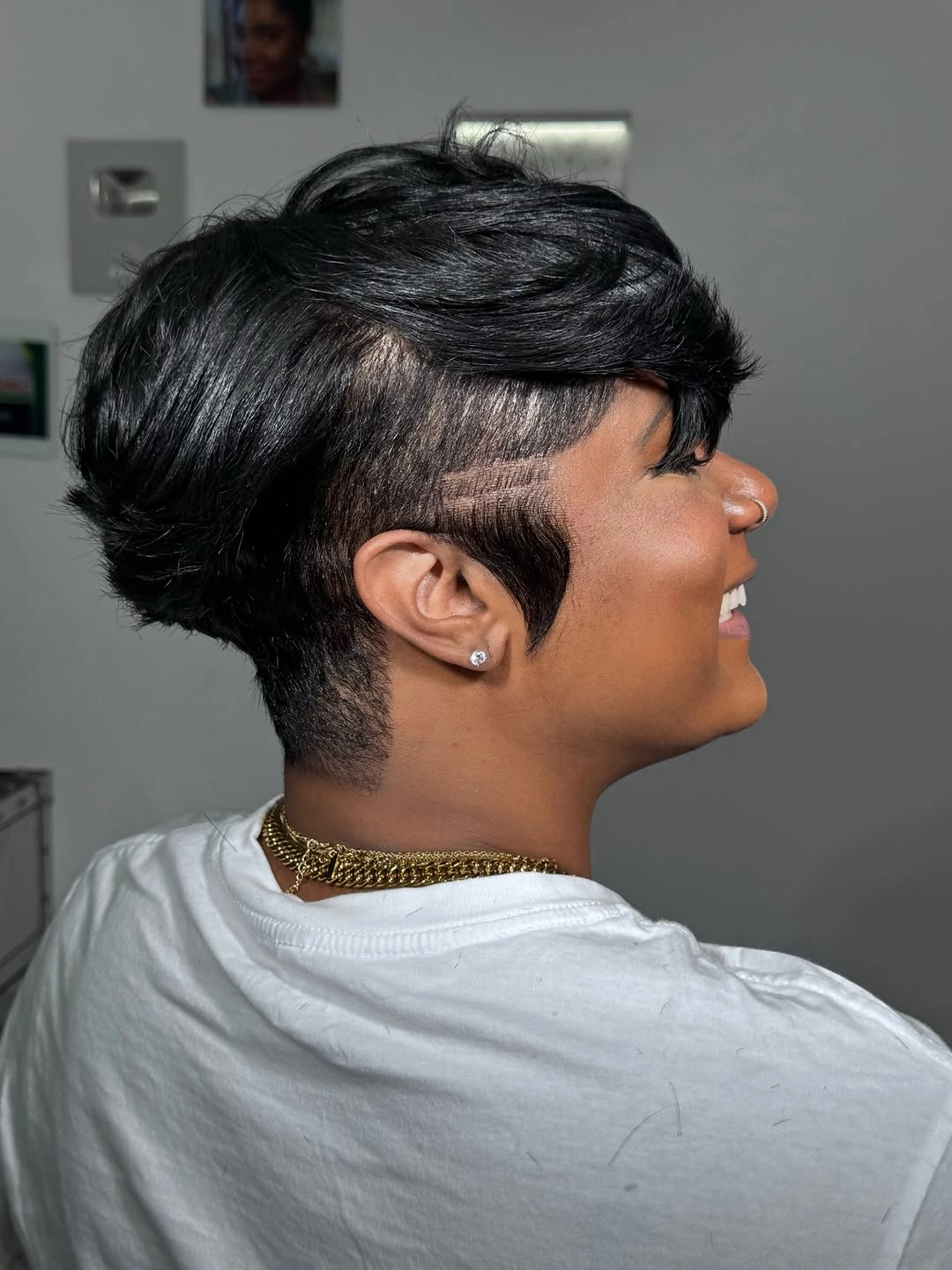 beautiful and trendy haircuts for black women 2027 Layered Short Masc Pixie with Graphic Sides